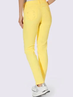 Jean skinny avec broderie et effet ventre plat