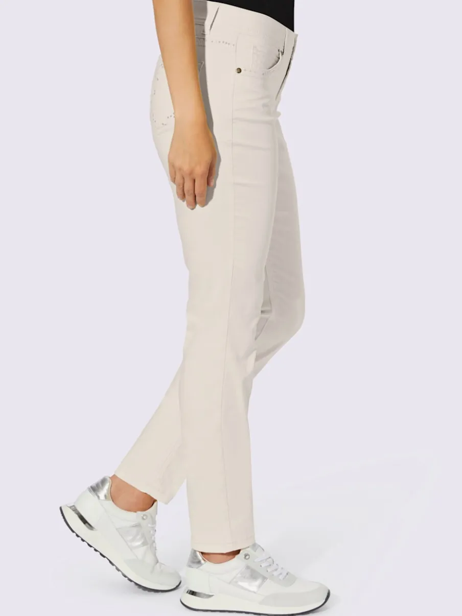 Jean skinny avec broderie et effet ventre plat