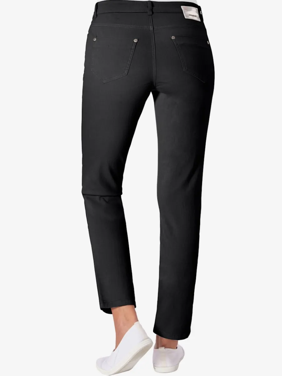 Jean skinny avec quatre poches et rivets décoratifs