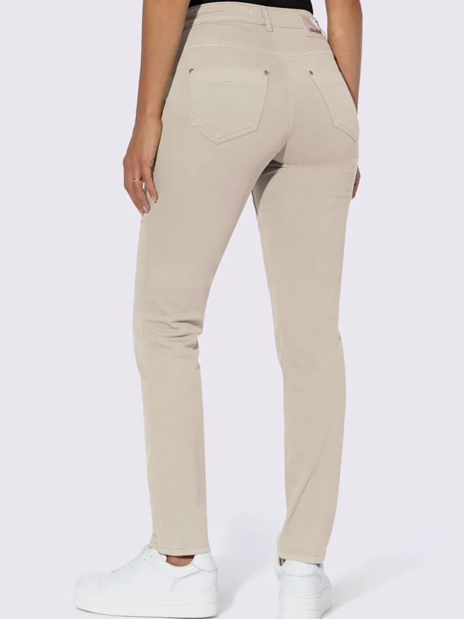 Jean skinny avec quatre poches et rivets décoratifs