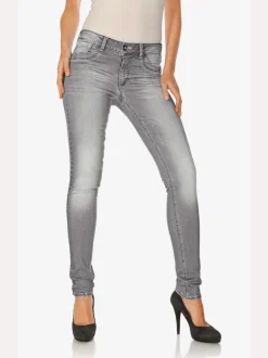 Jean skinny effet ventre plat avec matière élastique