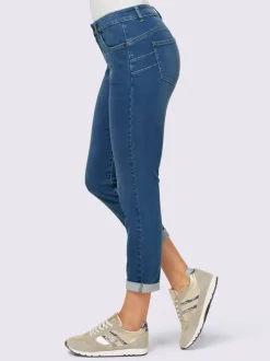 Jean slim cinq poches effet push-up délavé usé