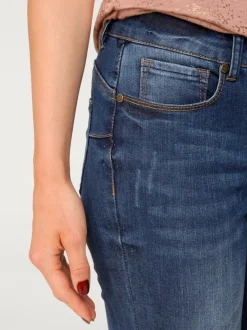 Jean slim fit 7/8 effet ventre plat usé