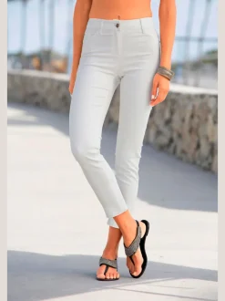 Jegging 7/8 coupe étroite avec poches décoratives et denim élastique