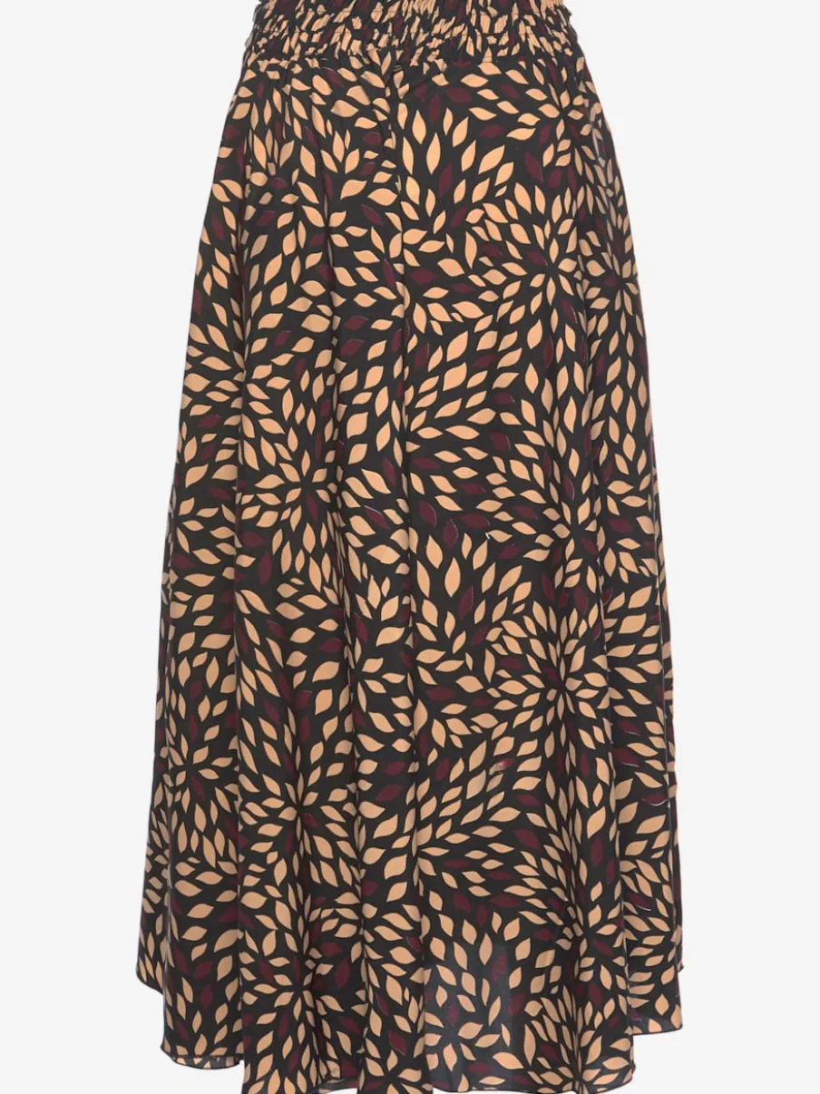 Jupe-culotte à jambes extra-larges avec ceinture froncée et ourlet ondulé