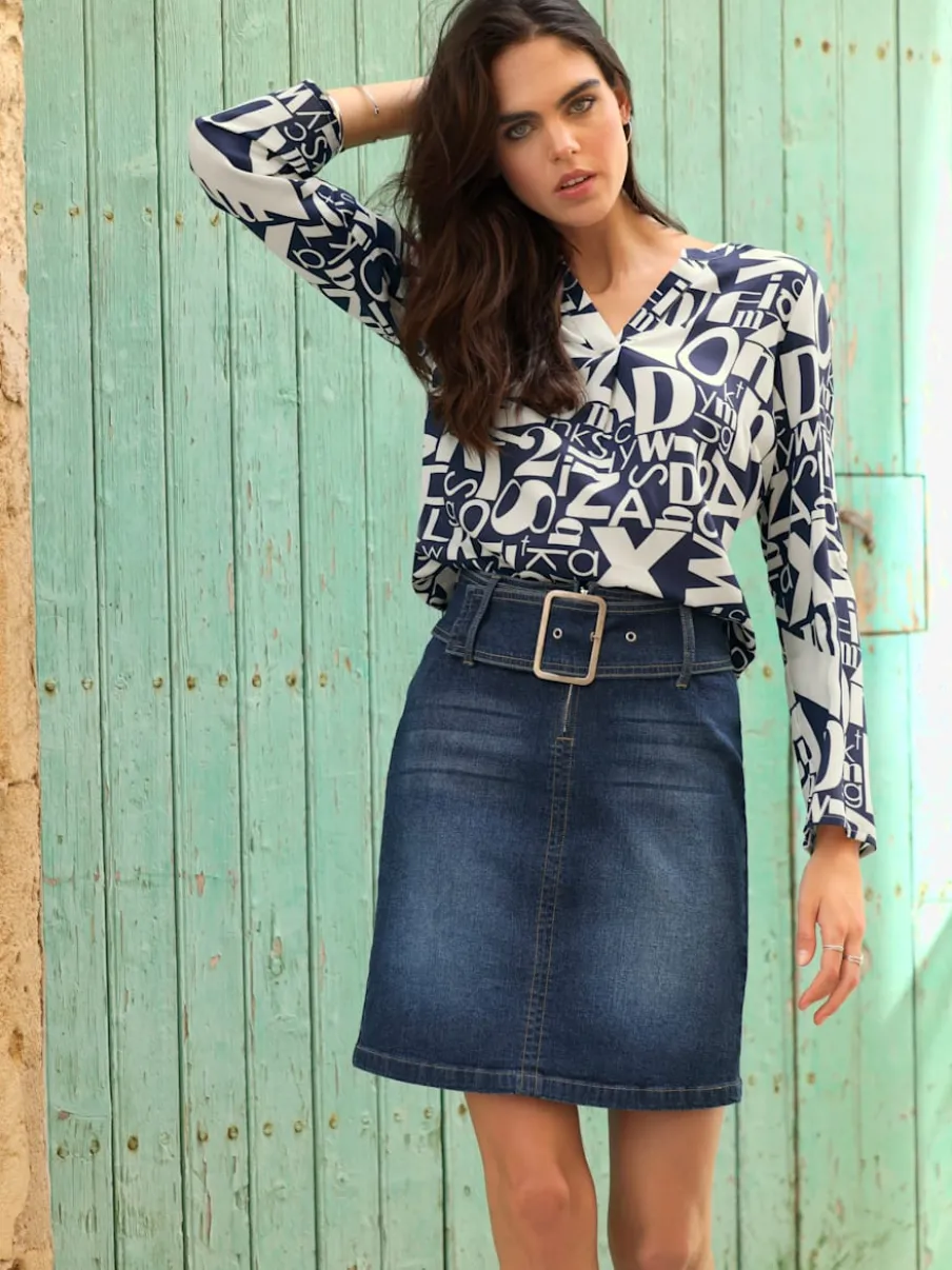 Jupe en jean avec ceinture intégrée et zip.