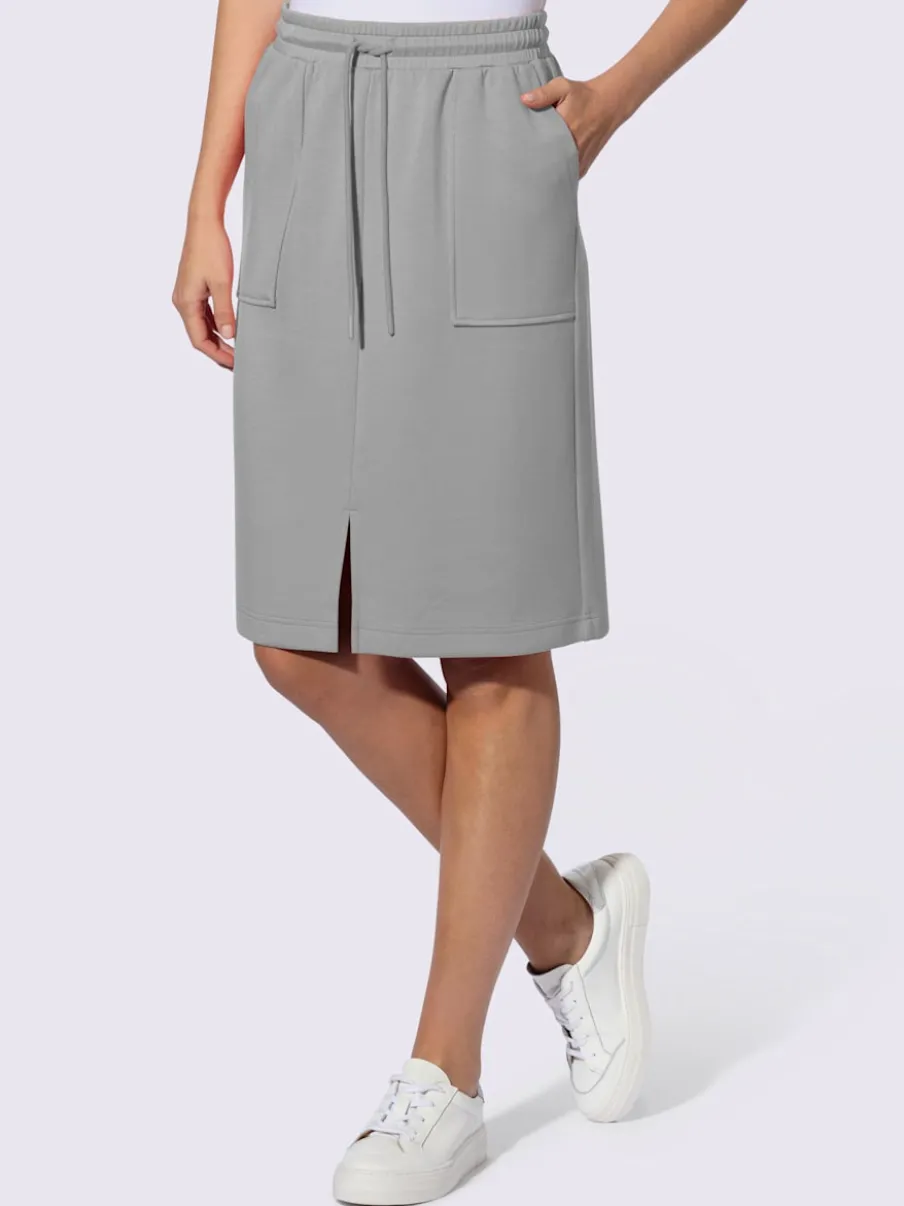Jupe en jersey avec ceinture élastique et poches plaquées