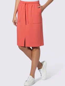Jupe en jersey avec ceinture élastique et poches plaquées