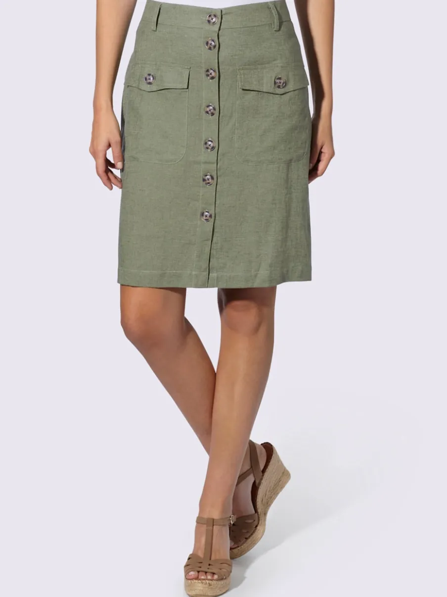 Jupe estivale en lin avec patte de boutonnage et poches.
