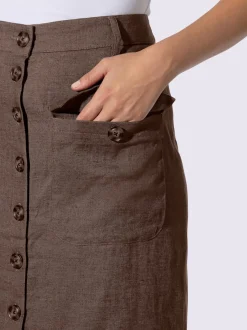 Jupe estivale en lin avec patte de boutonnage et poches.