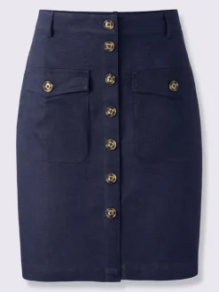 Jupe estivale en lin avec patte de boutonnage et poches.