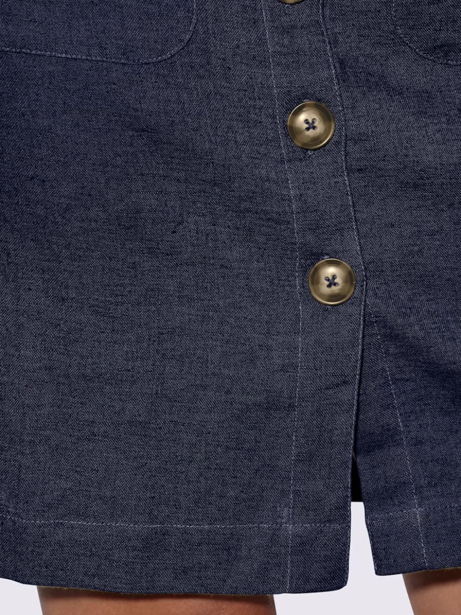 Jupe estivale en lin avec patte de boutonnage et poches.