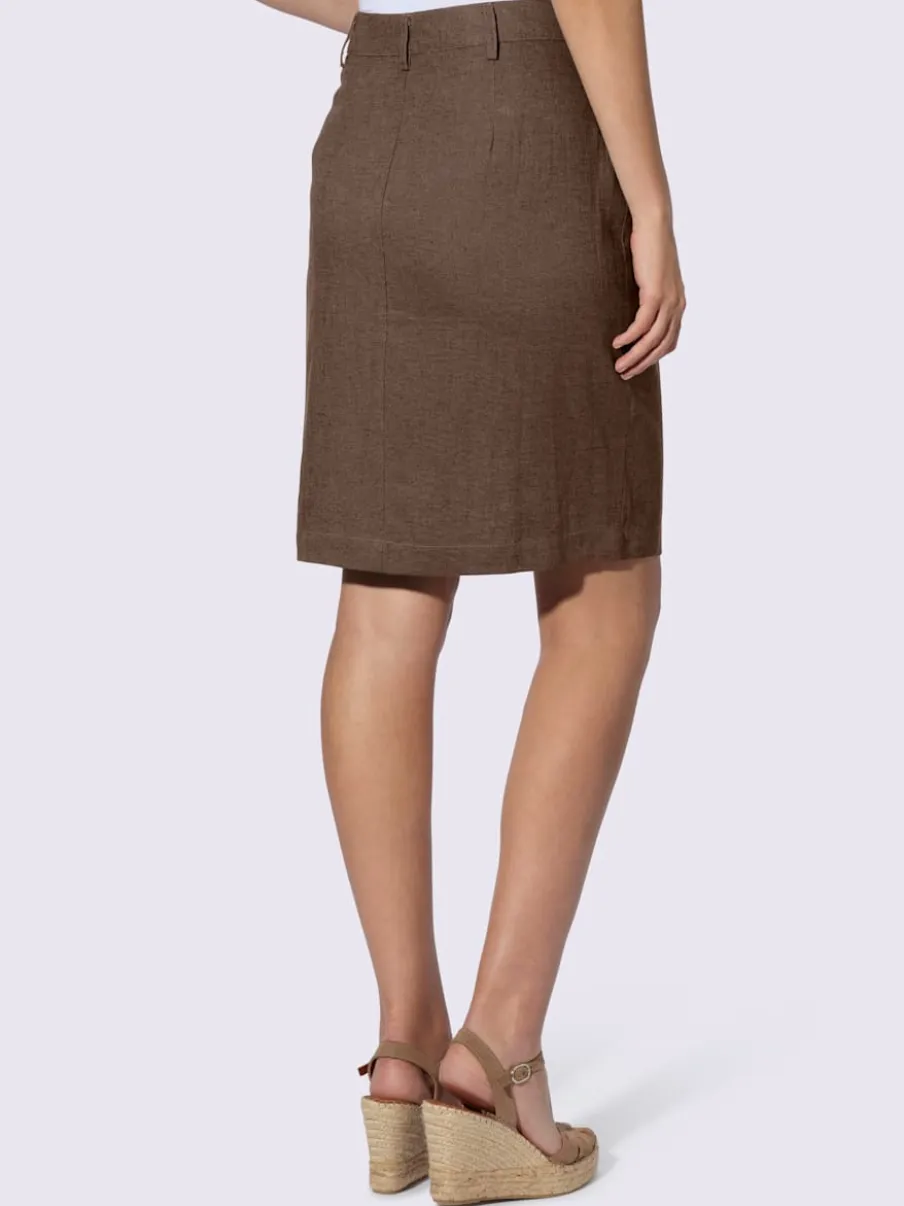 Jupe estivale en lin avec patte de boutonnage et poches.