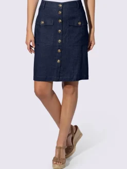 Jupe estivale en lin avec patte de boutonnage et poches.