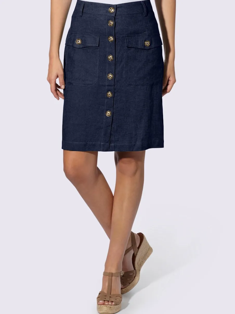 Jupe estivale en lin avec patte de boutonnage et poches.