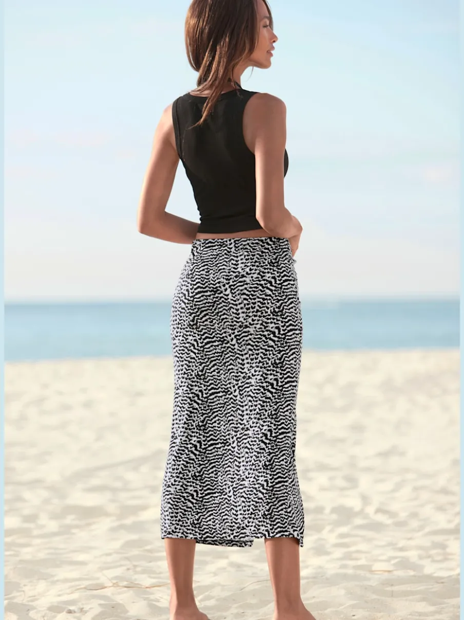 Jupe midi avec ceinture élastique et grande fente