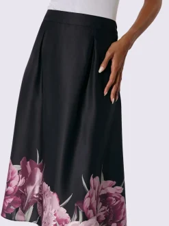 Jupe tissée évasée avec ceinture élastique et bordure florale