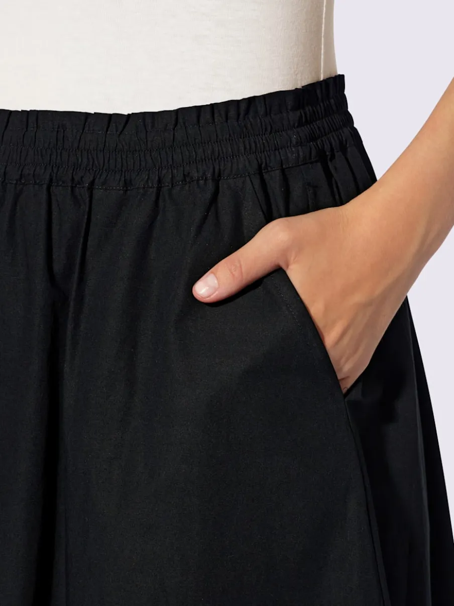Jupe évasée avec ceinture élastique et poches cousues
