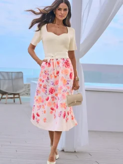 Jupe évasée avec motif floral et poches latérales