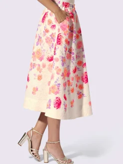 Jupe évasée avec motif floral et poches latérales