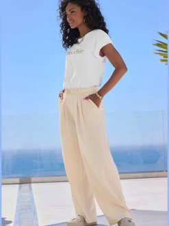 Large pantalon en tissu avec détail décoratif à la ceinture