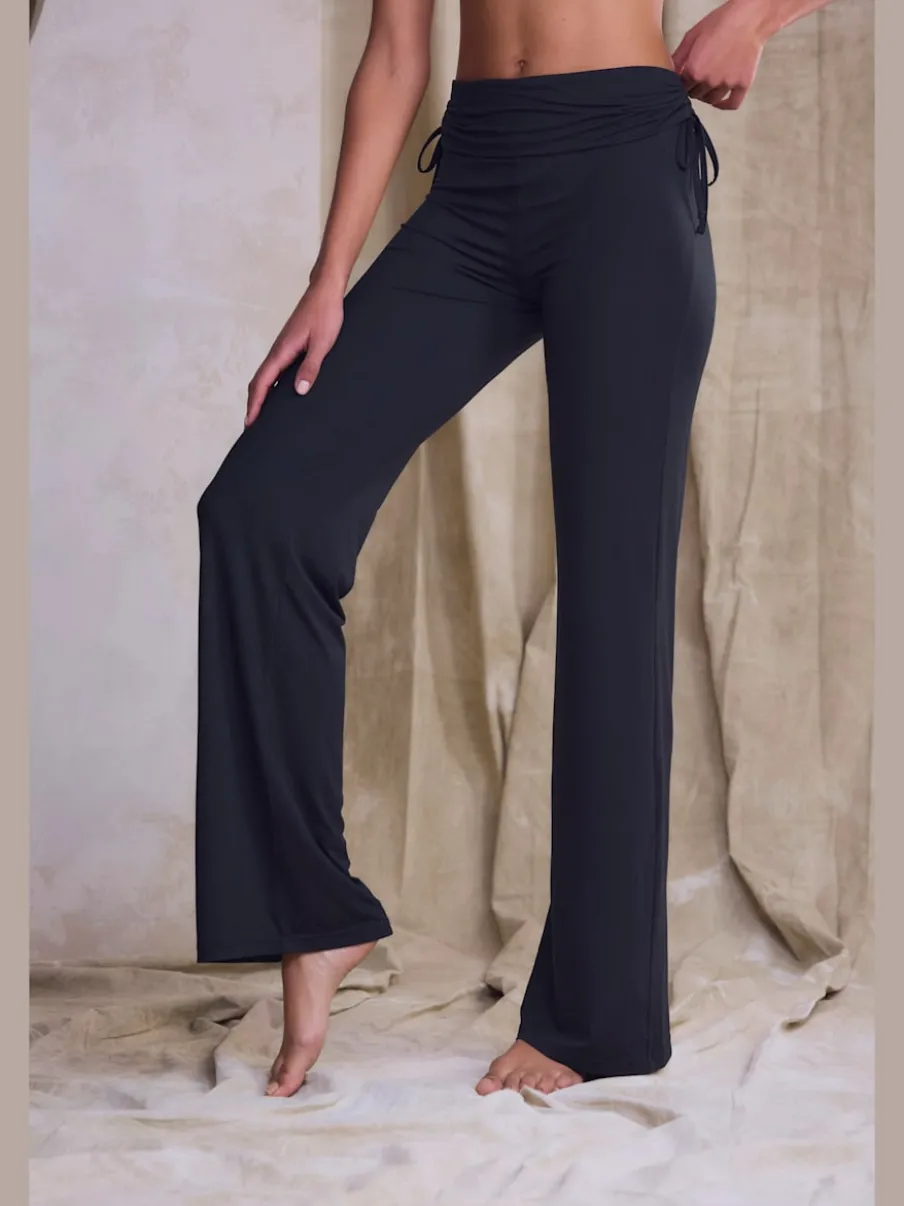 Legging avec jambes évasées doux et fluide à la taille