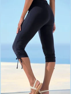 Legging corsaire ajusté avec ceinture élastique et coulisses latérales