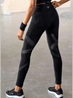 Leggings avec motifs réfléchissants et poche téléphone pratique