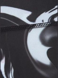 Leggings corsaires fonctionnels avec empiècements et poche zippée