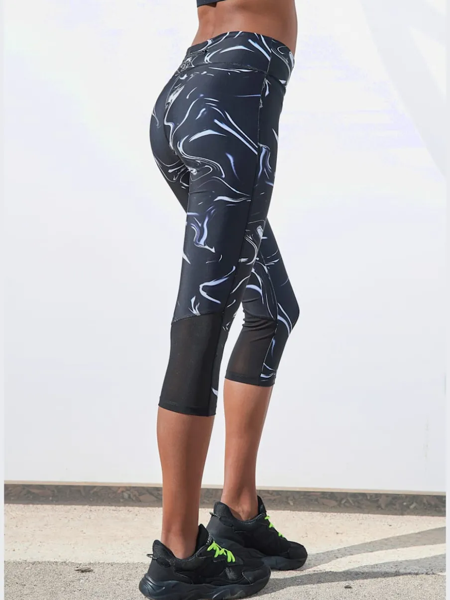 Leggings corsaires fonctionnels avec empiècements et poche zippée
