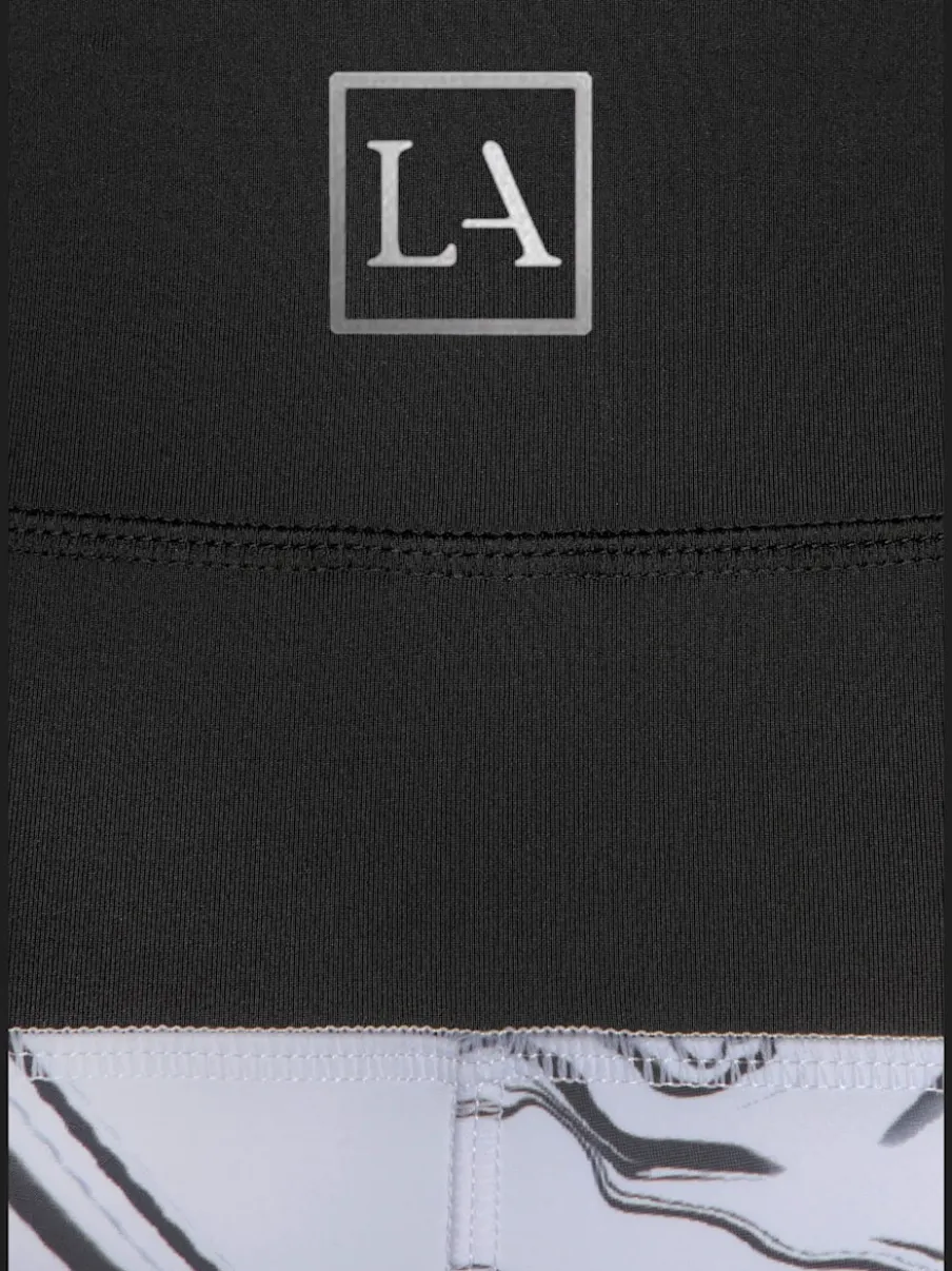 Leggings de sport performance en matière élastique avec empiècements