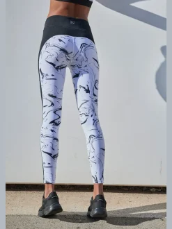 Leggings de sport performance en matière élastique avec empiècements