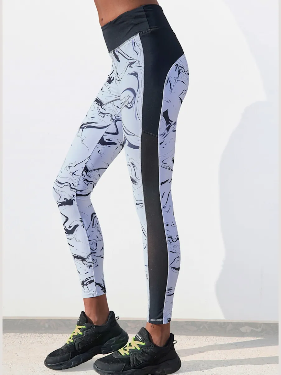 Leggings de sport performance en matière élastique avec empiècements