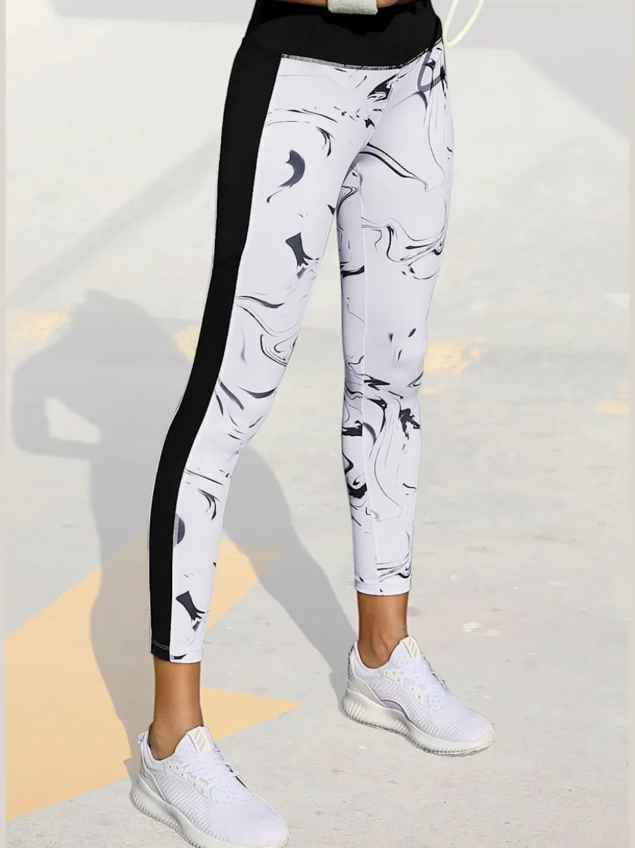 Leggings de sport performance en matière élastique avec empiècements