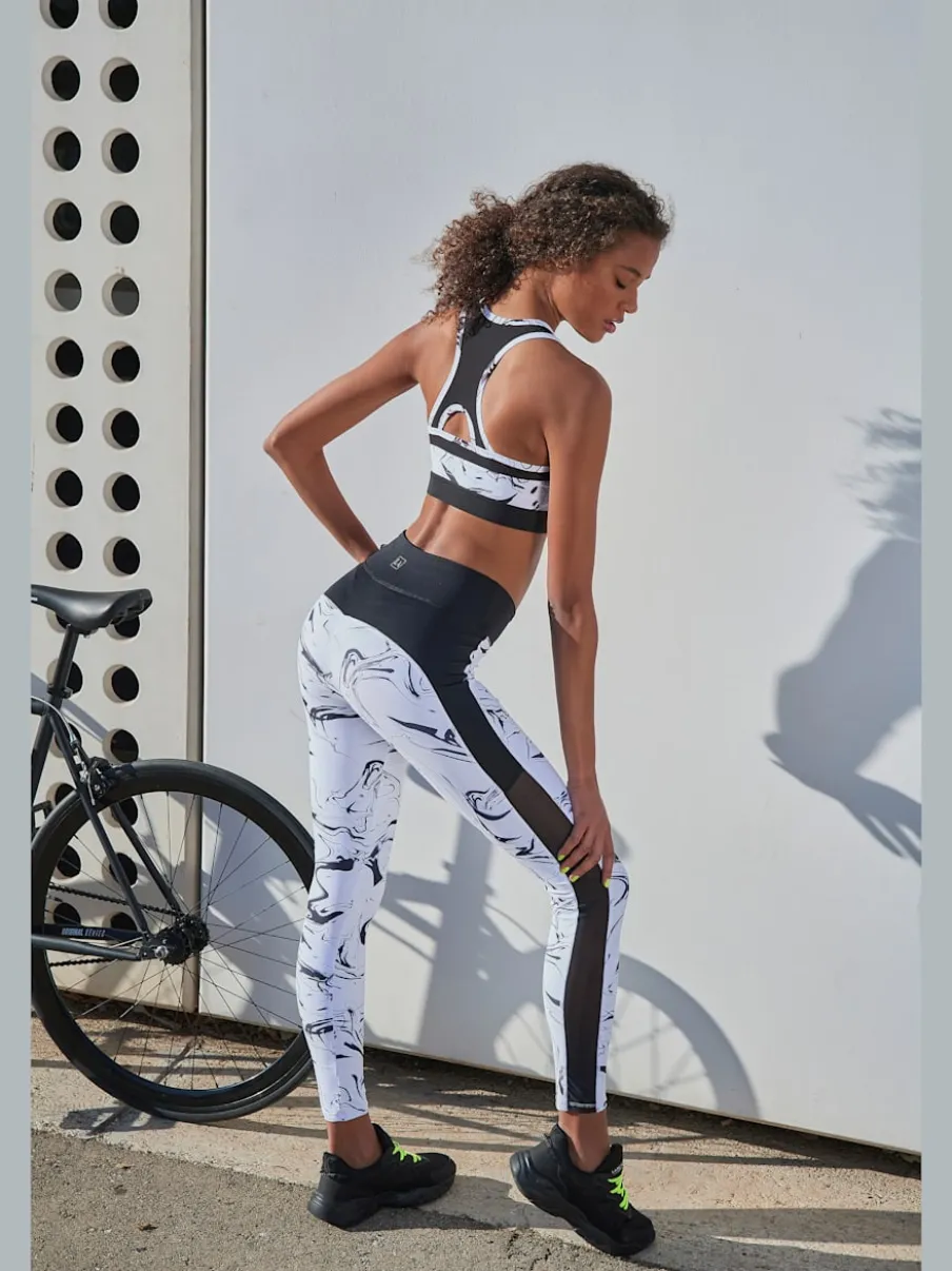 Leggings de sport performance en matière élastique avec empiècements