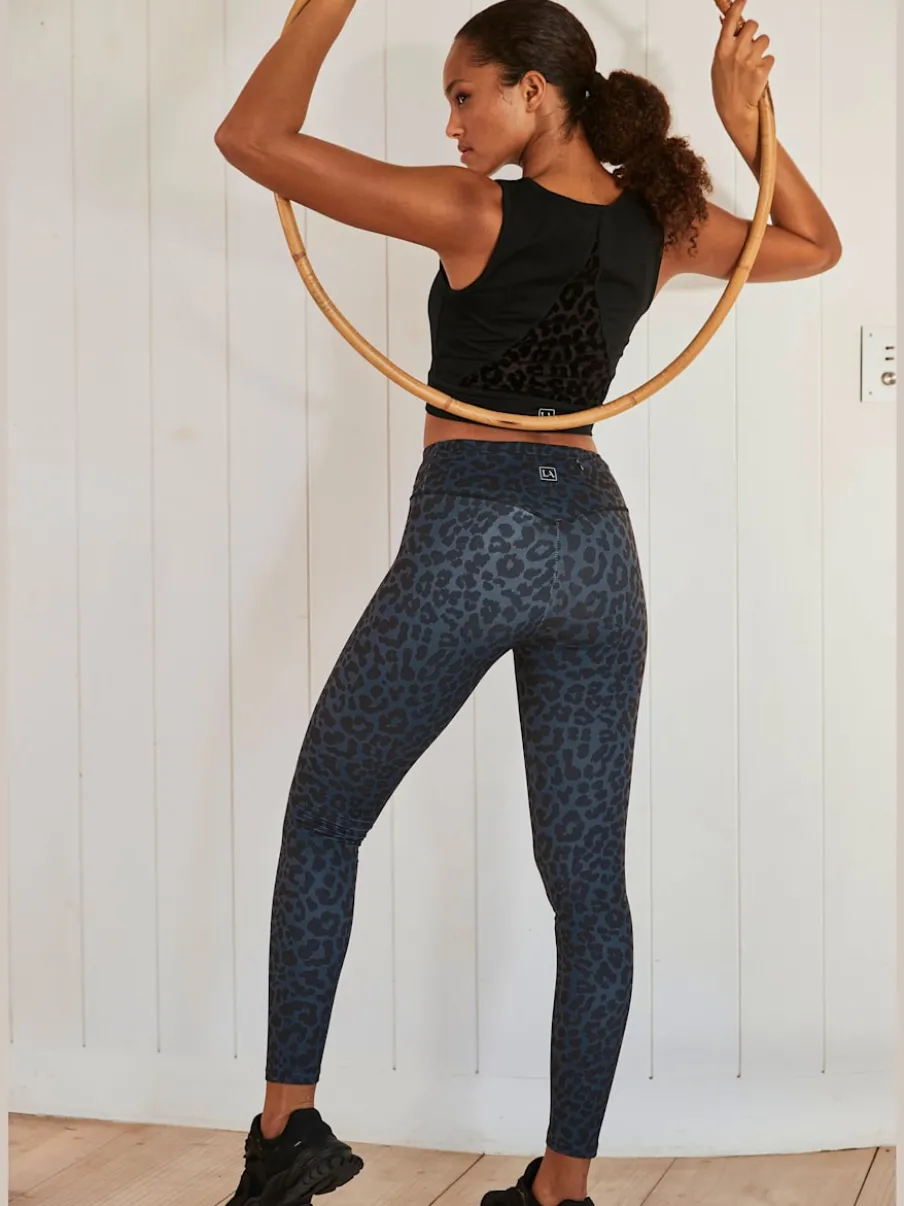 Leggings performance avec bord-côte en V et motif léopard