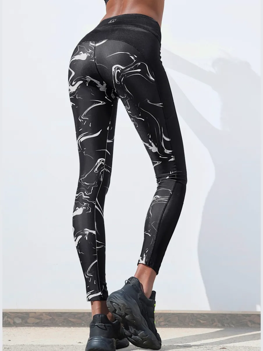 Leggings performance avec empiècements et poche ceinture