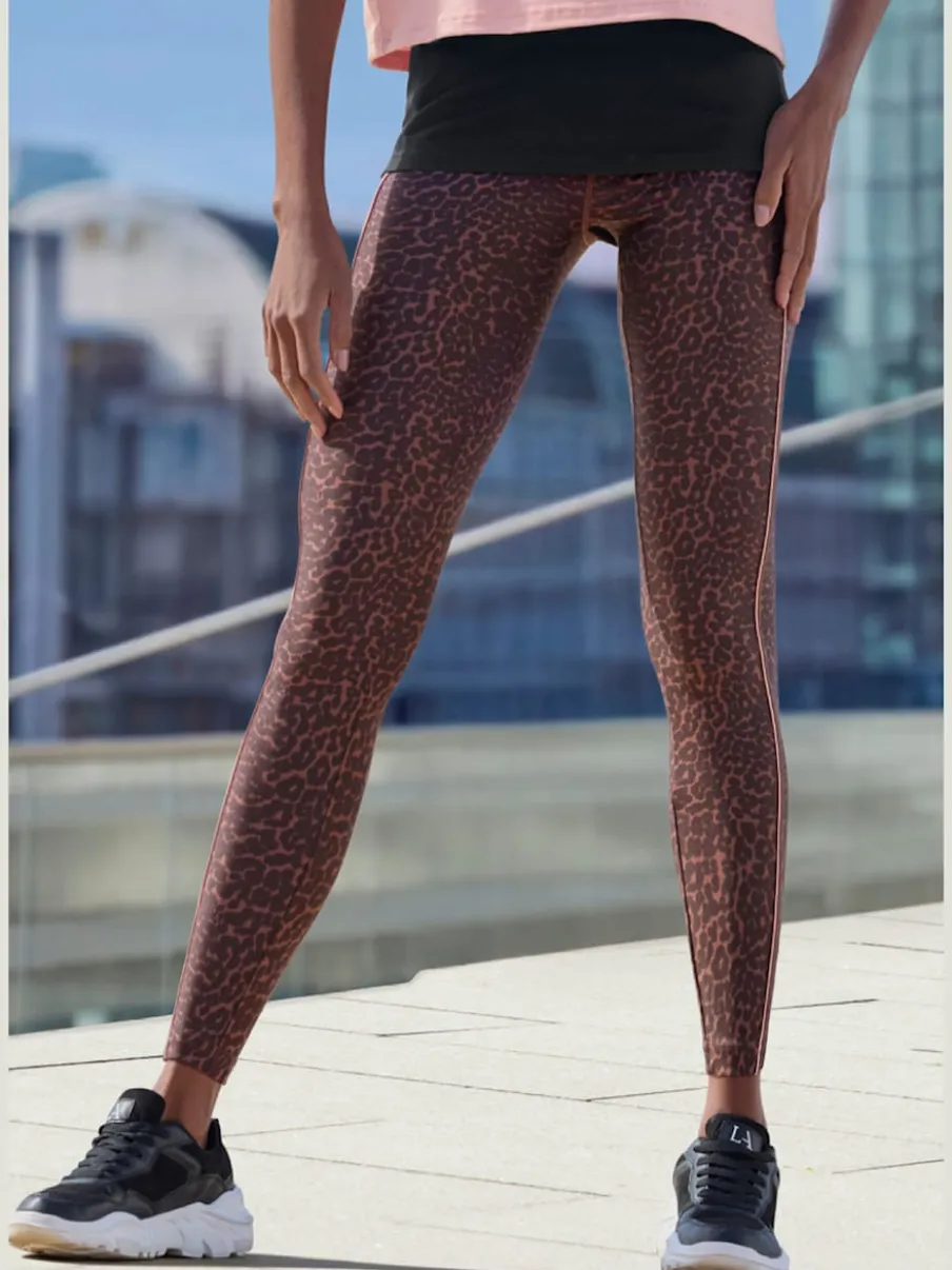 Leggings performance à imprimé animal avec ceinture élastique et passepoils contrastés