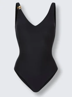 Maillot de bain avec broche dorée et bonnets doux