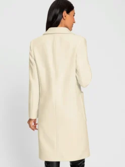 Manteau court à col revers avec grandes poches spacieuses