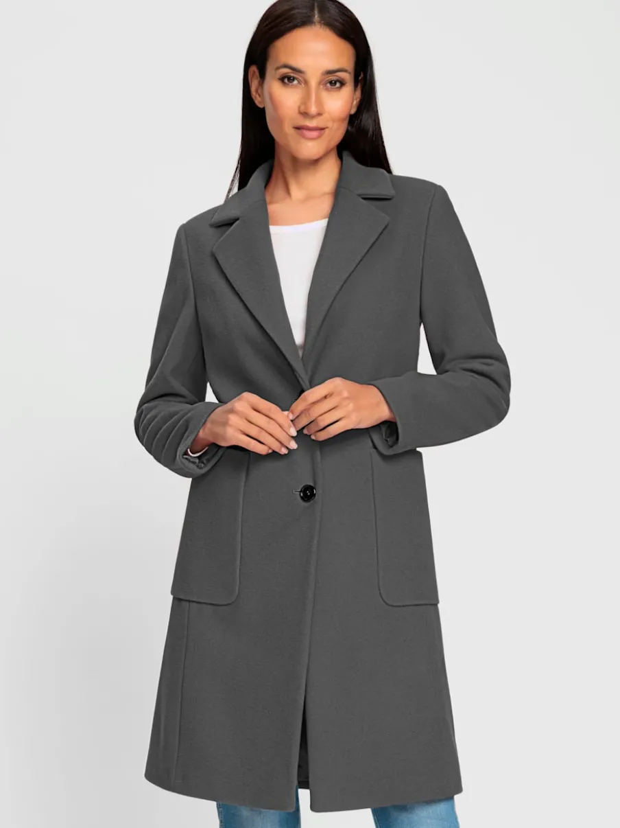 Manteau court à col revers avec grandes poches spacieuses
