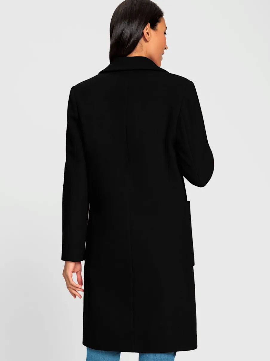 Manteau court à col revers avec grandes poches spacieuses