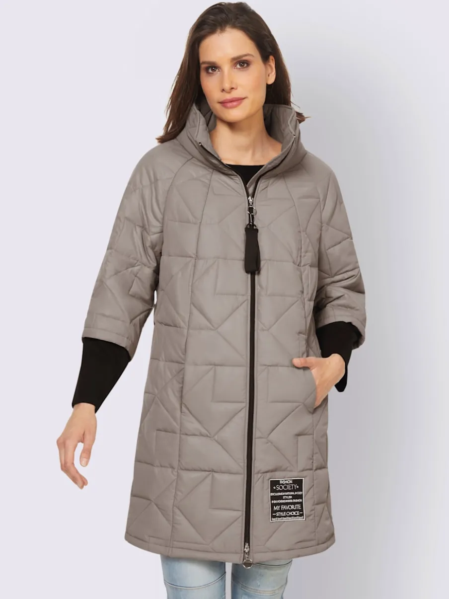 Manteau court matelassé avec logo et poches fendues