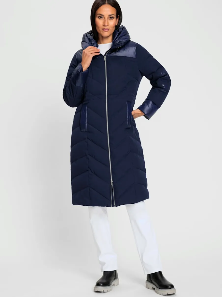 Manteau matelassé avec capuche et glissière à double sens