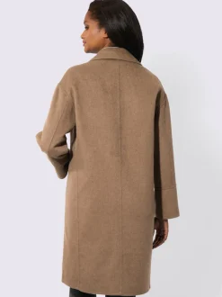 Manteaux courts avec col revers et larges manchettes