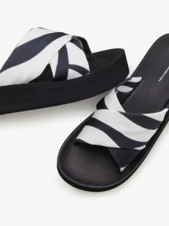 Mules chaussures de bain estivales au look animal tendance avec semelle imperméable et talon légèrement compensé