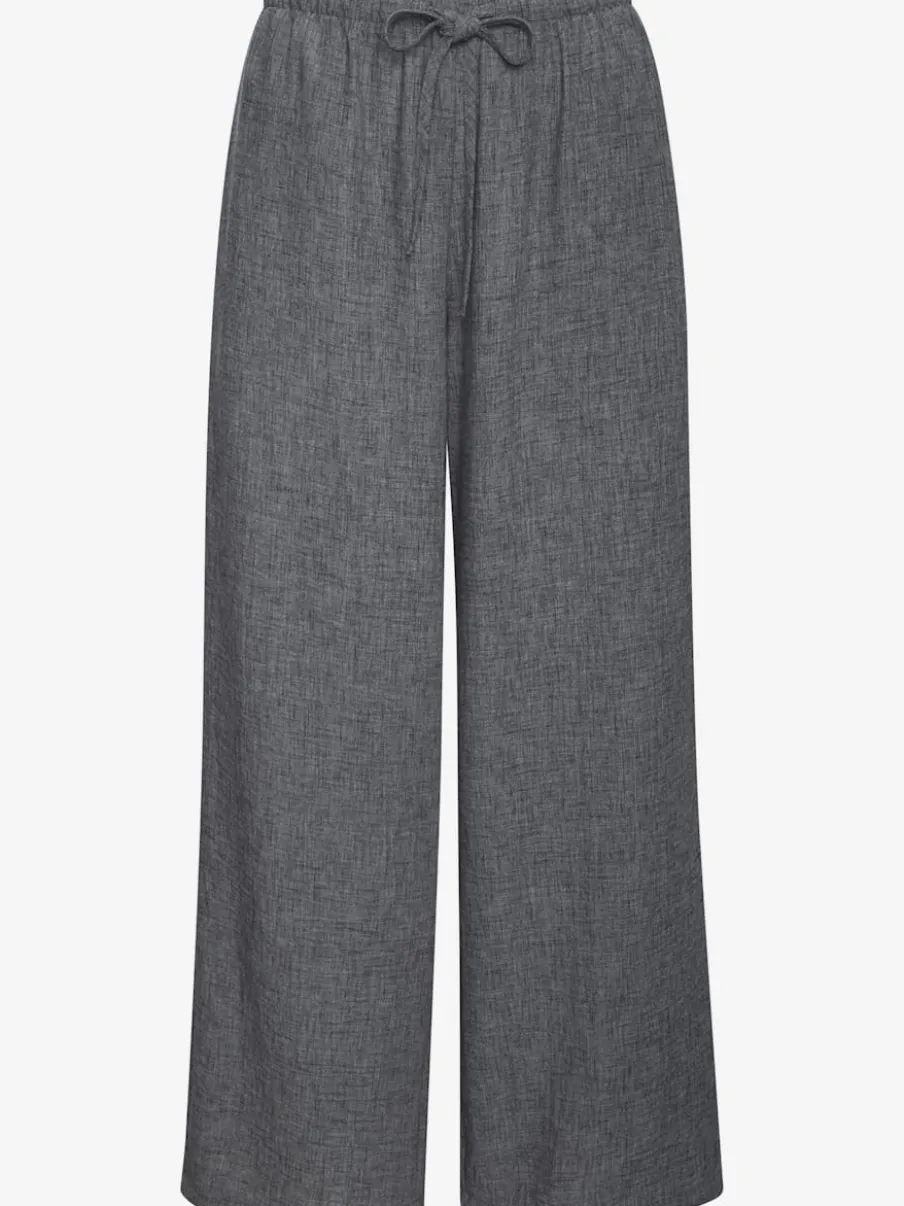 Pantalon ample avec ceinture et manches courtes en matière légère