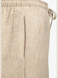 Pantalon ample avec ceinture et manches courtes en matière légère