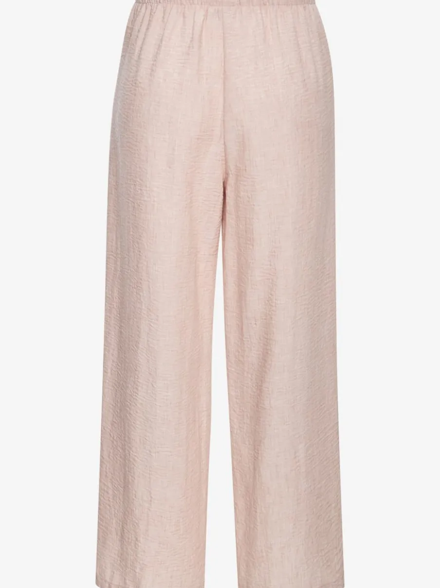 Pantalon ample avec ceinture et manches courtes en matière légère