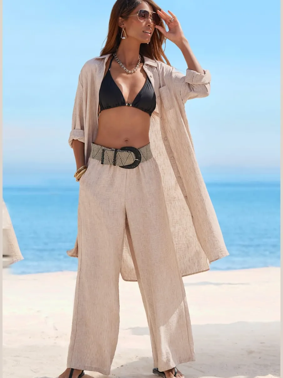 Pantalon ample avec ceinture et manches courtes en matière légère